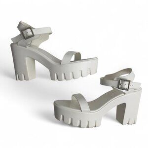 Womans Size US 7 White platform sandals with adjustable ankle strap and 4in heel